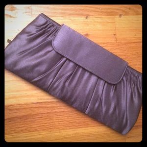 Never been used grey polyester clutch!